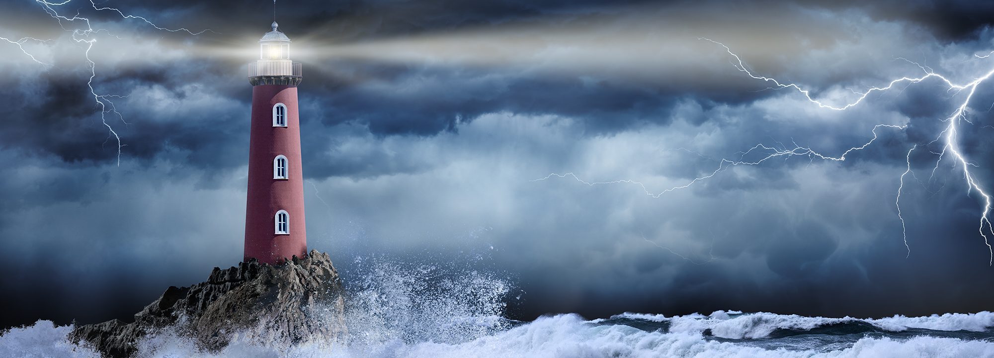 A lighthouse in a storm illustrates the concept of economic resiliency